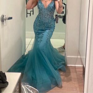 Elegant Blue Beaded Gown JOVANI AQUA MERMAID PROM DRESS
STYLE 56032A